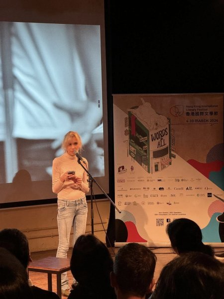 Sadie-Kaye-reads-at-the-2024-Hong-Kong-Int-Lit-Fest-book-launch-of-Lost-in-Transition